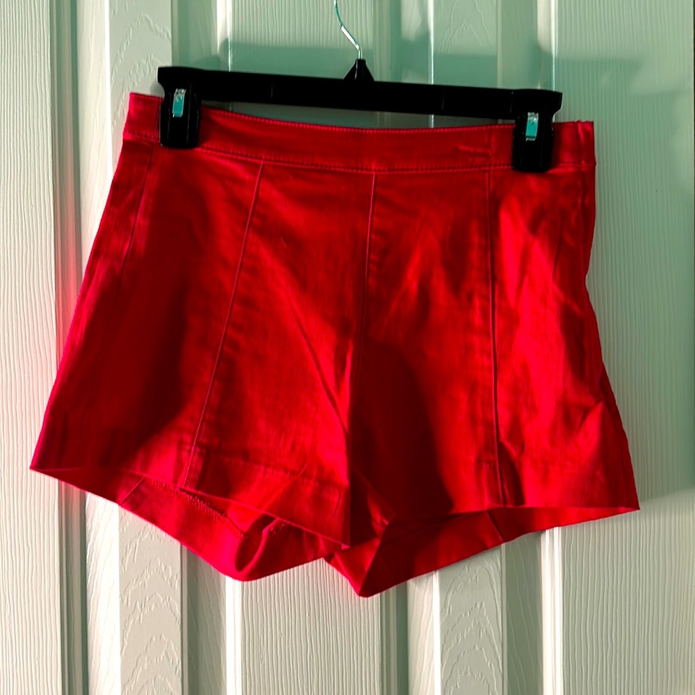 Red shorts , size 6, H&M , new with tag .